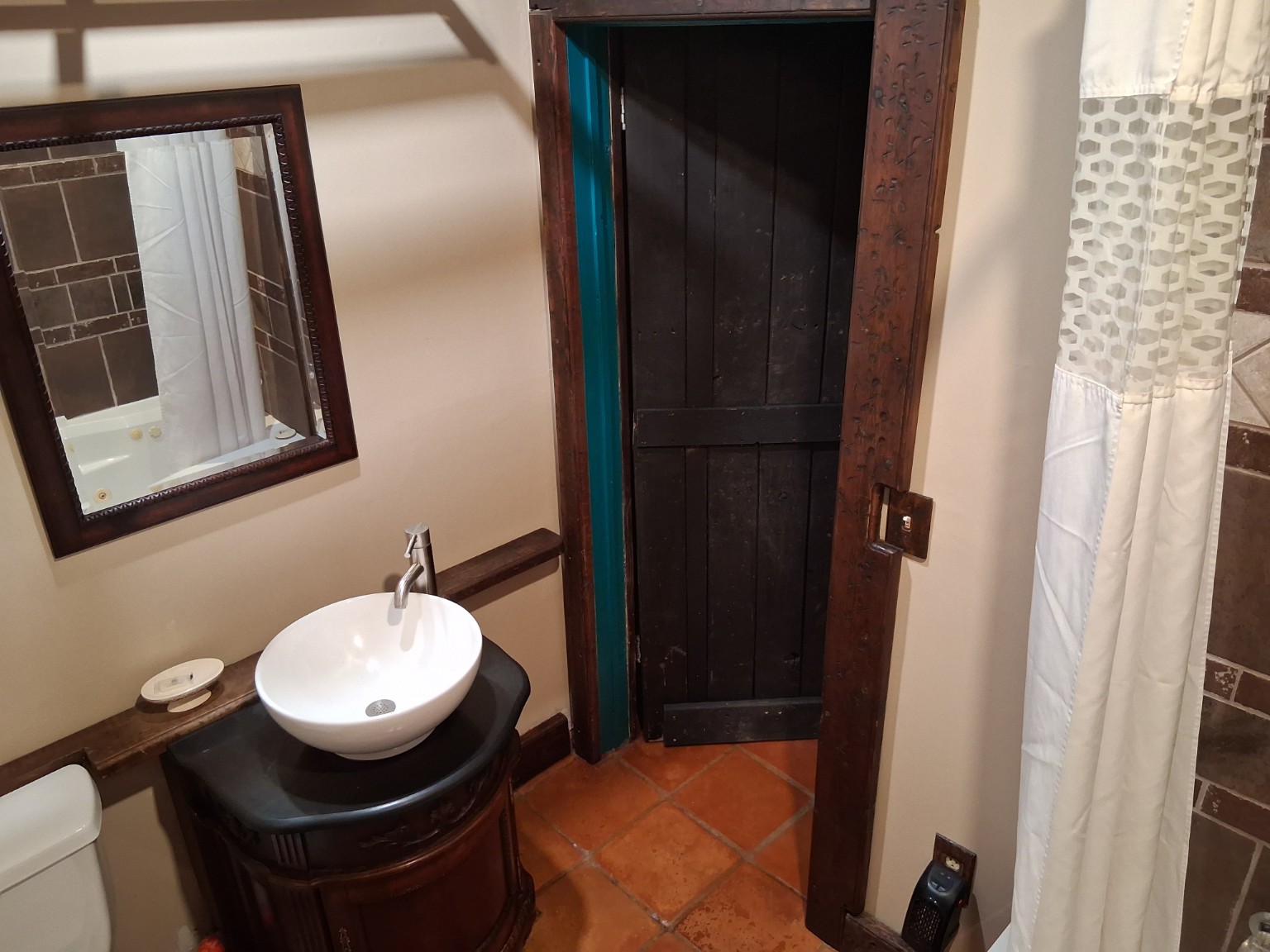 Bathroom sink and rustic wood details