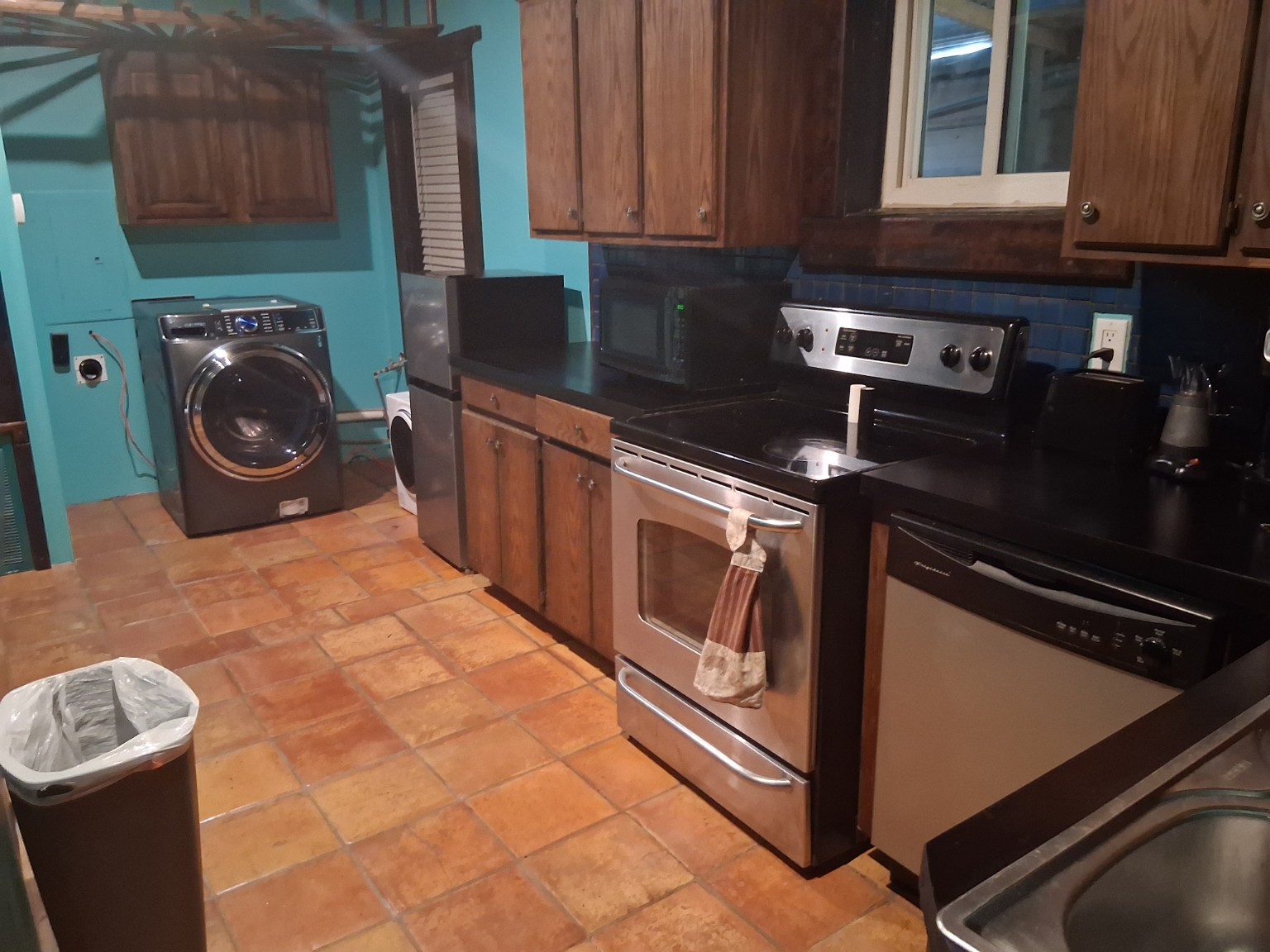 Kitchen appliances and laundry area